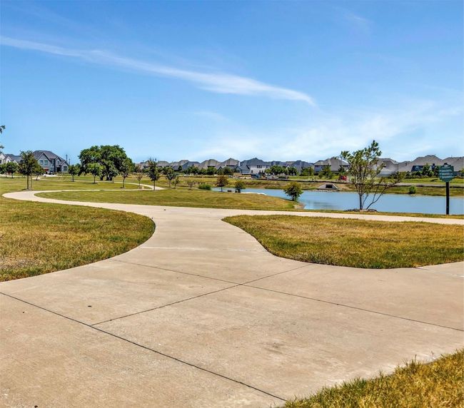 View of property's community featuring a yard and a water view | Image 35