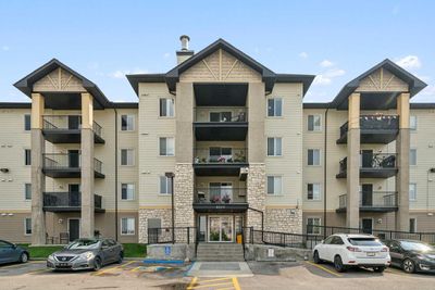 6408 - 304 Mackenzie Way Sw, Condo with 2 bedrooms, 2 bathrooms and 1 parking in Airdrie AB | Image 2