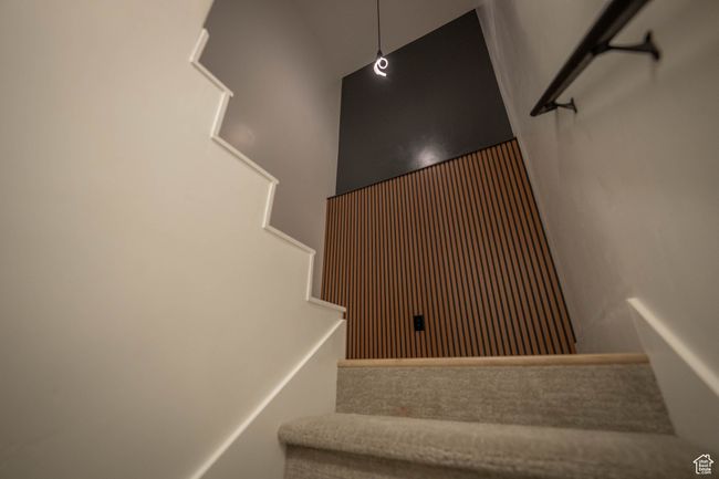 View of staircase & accent wall. | Image 30