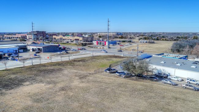 To the right of the Red O'reilly building | Image 27