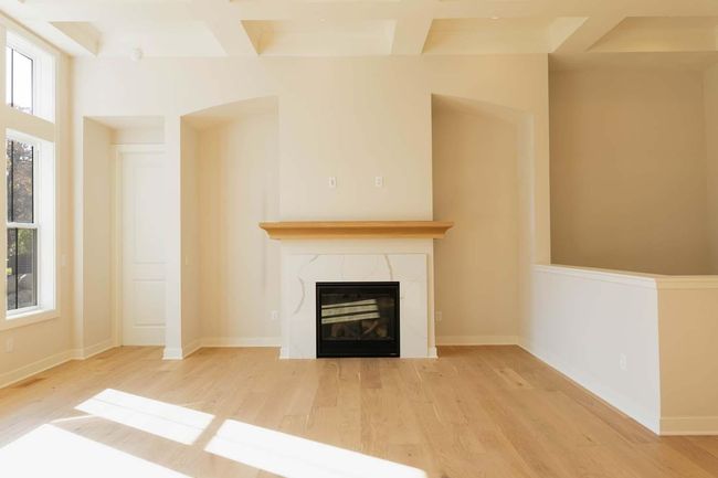 Ready this Fall! Includes custom fireplace media cabinets & wood staircase railing w/metal balusters (not shown). Photos may not depict actual home plan configuration. Features/materials/finishes shown may contain options that are not included. | Image 4