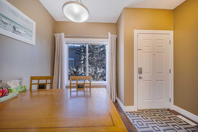 84 Bridleridge Manor Sw, Home with 3 bedrooms, 2 bathrooms and 1 parking in Calgary AB | Image 6