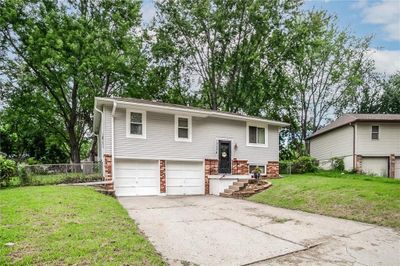 Split entry home with a garage and a front yard | Image 3