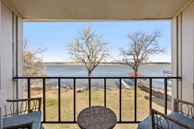 Primary bedroom balcony overlooking Eagle Mountain Lake | Image 25