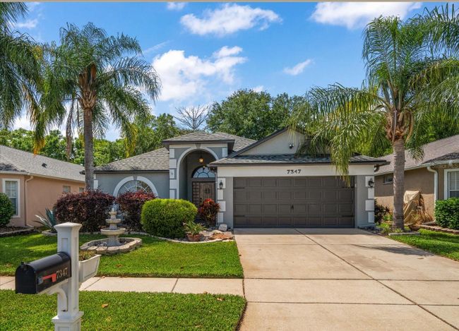 7347 Newhall Pass Lane, House other with 3 bedrooms, 2 bathrooms and null parking in Wesley Chapel FL | Image 1