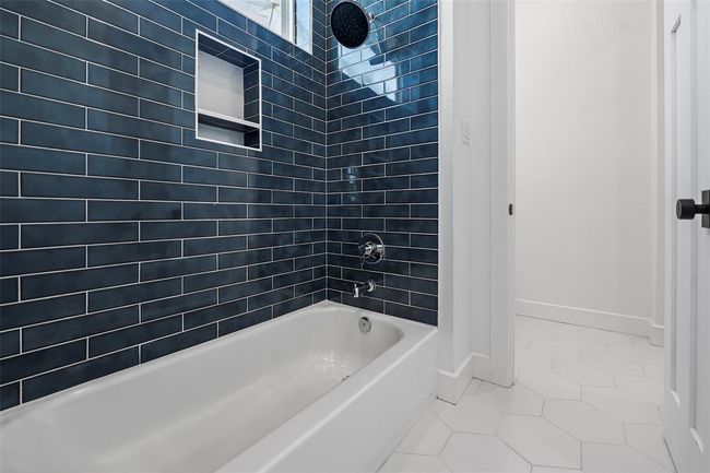 Stylish Jack & Jill bathroom with modern finishes and convenient dual access. | Image 41