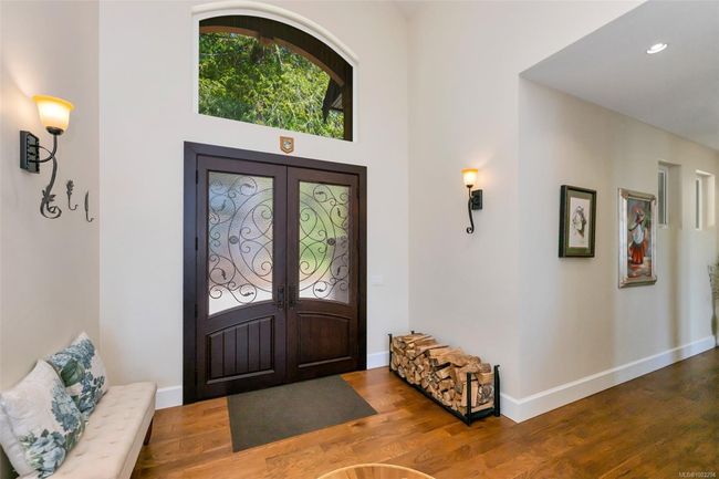 Foyer with french doors and wood finished floors | Image 68