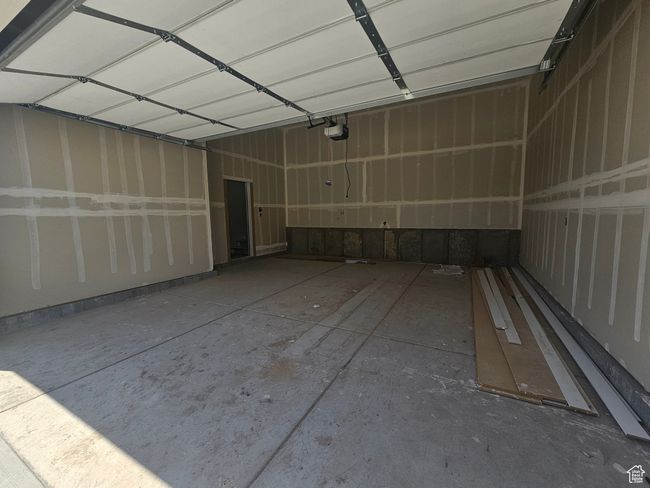 Garage featuring a garage door opener | Image 5