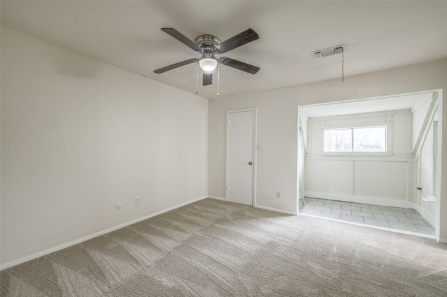 Unfurnished bedroom with carpet floors and ceiling fan | Image 21