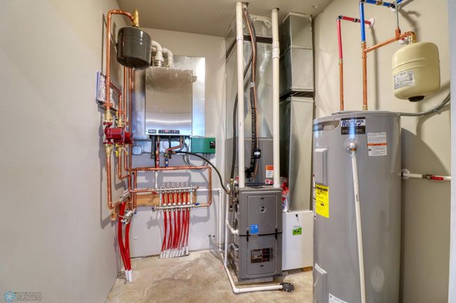 Utility Room with Gas Forced Air Furnace, In Floor Heat and Elec Hot Water | Image 40