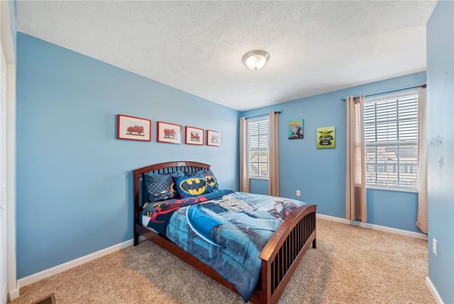 3nd bedroom with overhead lighting and plenty of natural light. | Image 28