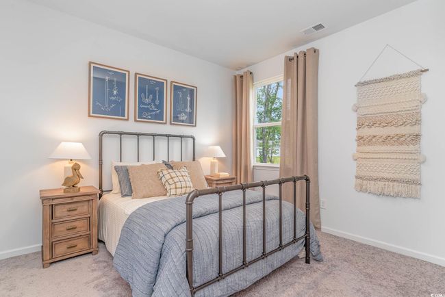 Bedroom featuring light colored carpet | Image 20