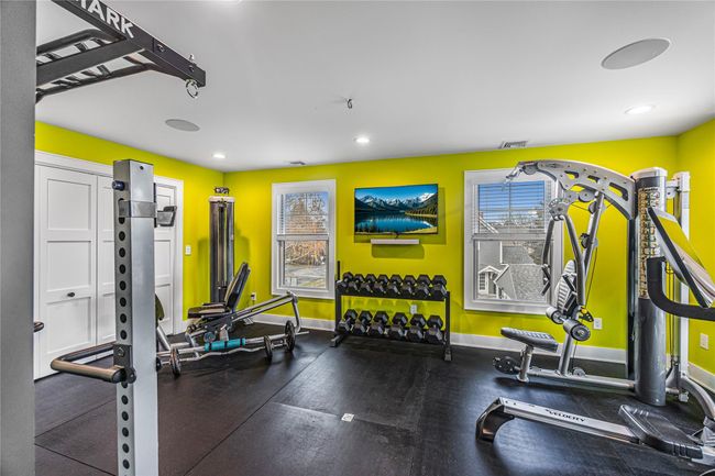 Exercise room featuring baseboards, visible vents, and recessed lighting | Image 40