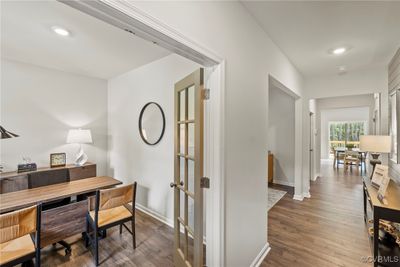 Home office with wood-type flooring | Image 2