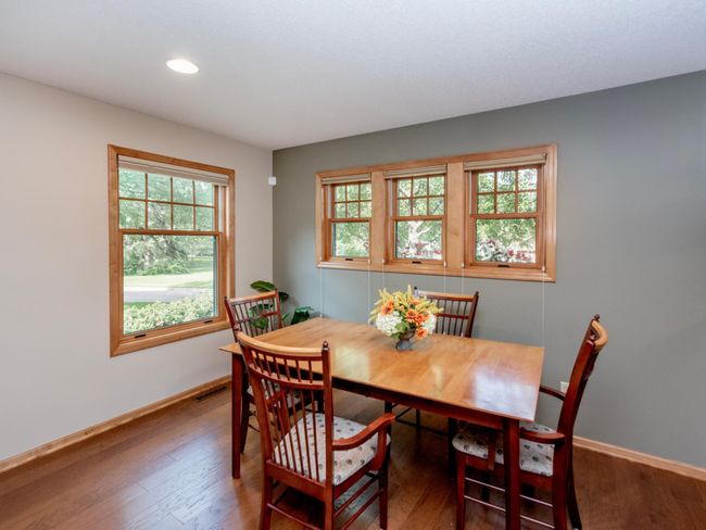 Open and inviting, the informal dining space offers seamless connectivity to the kitchen and living area, perfect for gatherings. | Image 11