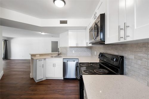 202-8851 Wiles Rd, Coral Springs, FL, 33067-1887 | Card Image