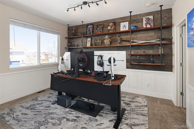 Great room with soaring ceilings opens to formal dining area | Image 8