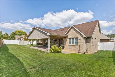 Back of property featuring a yard and a patio area | Image 3