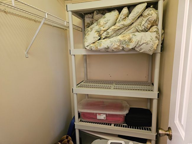 View of walk in closet | Image 18
