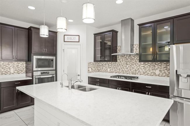 13299 Wildgrass Trl, House other with 4 bedrooms, 3 bathrooms and null parking in Odessa FL | Image 8