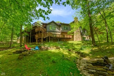 Multiple decks, screened porch and patio for entertaining or relaxing. | Image 1