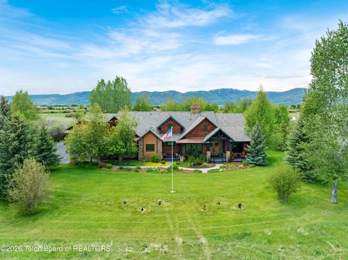 6176 Fox Meadows Dr, Victor, ID, 83455-5499 | Card Image