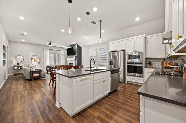 Breakfast Bar and Opens To Family Room. | Image 8