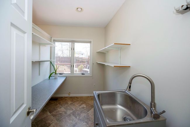 Main floor laundry room | Image 19