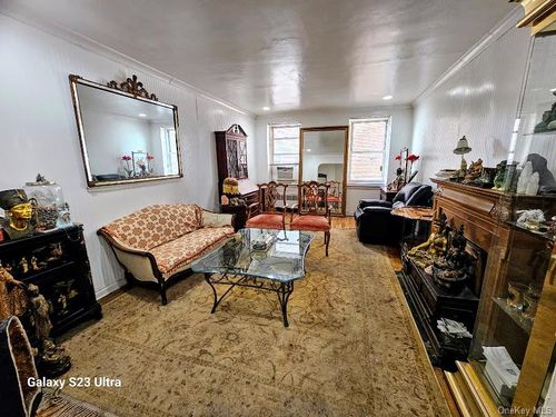 2m-76-10 34th Ave, Jackson Heights, NY, 11372-2242 | Card Image