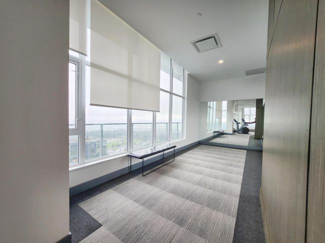 Corridor with carpet flooring, healthy amount of natural light, baseboards, and recessed lighting | Image 13