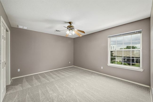 Spare room with carpet floors and ceiling fan | Image 25