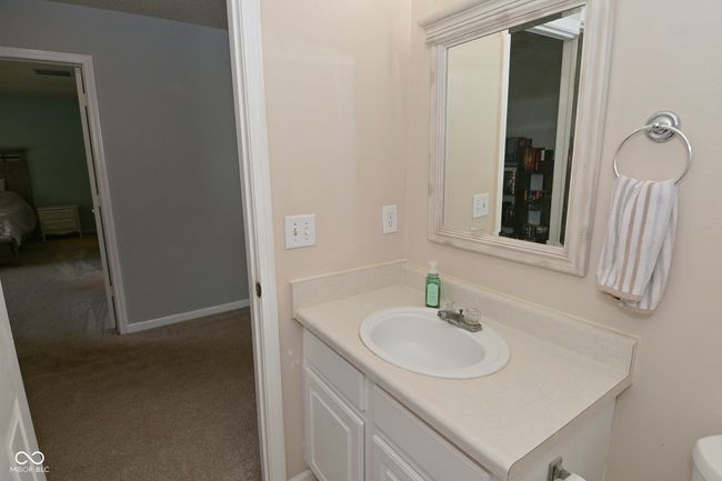 bathroom with vanity and toilet | Image 34