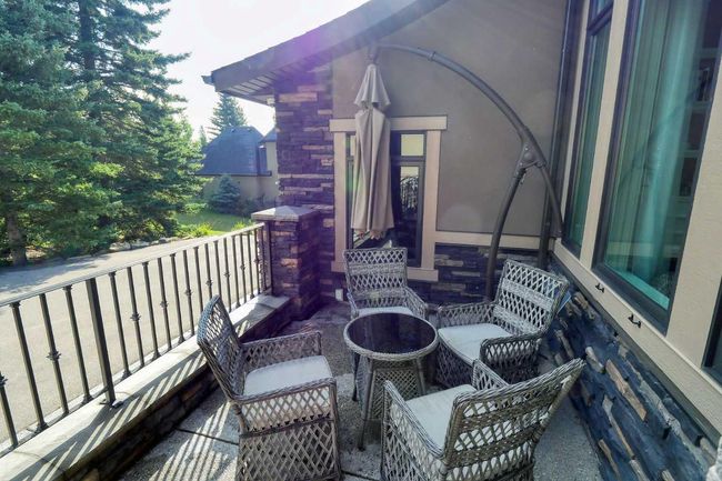 92 Hawk's Landing Dr, House other with 4 bedrooms, 4 bathrooms and null parking in Priddis AB | Image 4