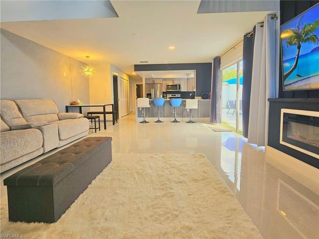 View of tiled living room | Image 8