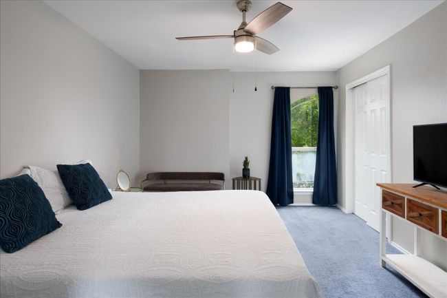 This 2nd bedroom is large enough for a king size bed. | Image 6