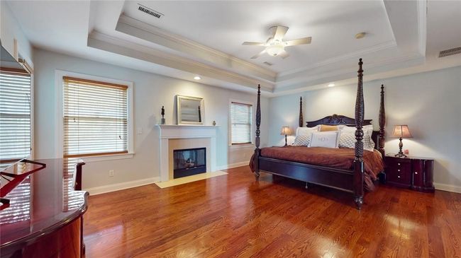 Primary Bedroom #1with Tray Ceiling and Gas Fireplace, Juliet Balcony | Image 13