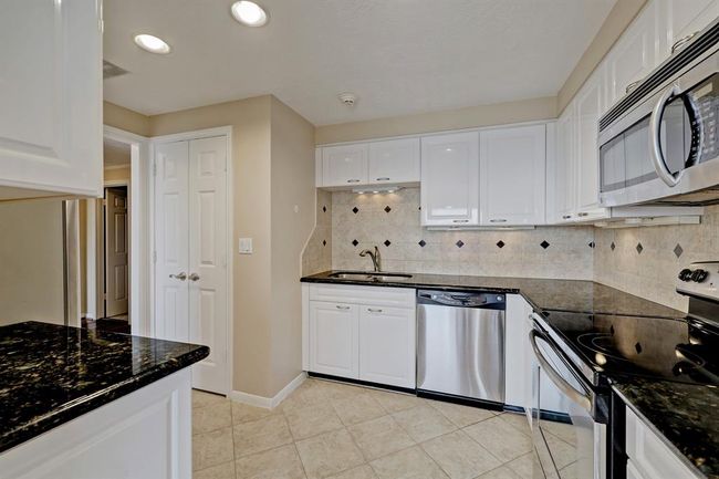 Updated kitchen is adjacent to the breakfast room | Image 5
