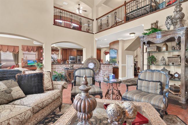 You'll have spectacular views of the hallway and game room above with the fabulous wrought iron balusters providing a restful accent. | Image 13