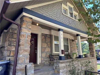 Doorway to property with covered porch | Image 1