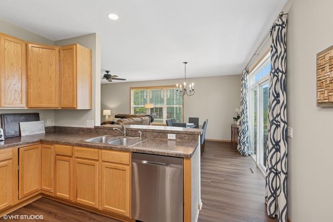 Just steps from the kitchen and dining room, the sliding glass door offers easy access to the deck | Image 20