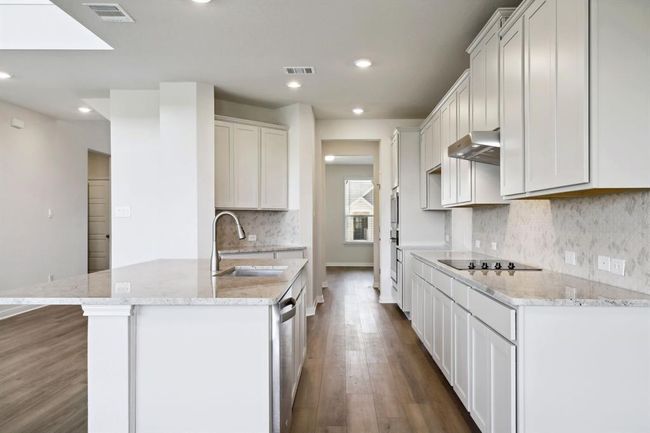 Photo is not of the actual home but is an inspirational photo of builder’s model home and may depict options, furnishings, and/or decorator features that are not included. | Image 7