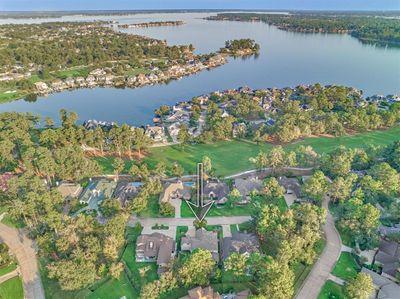 This lovely home is perfectly nestled behind the protective gates of Bentwater. | Image 3