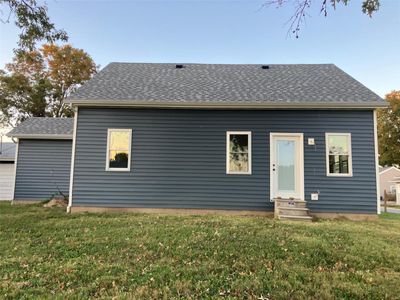 Back of house with a lawn | Image 3