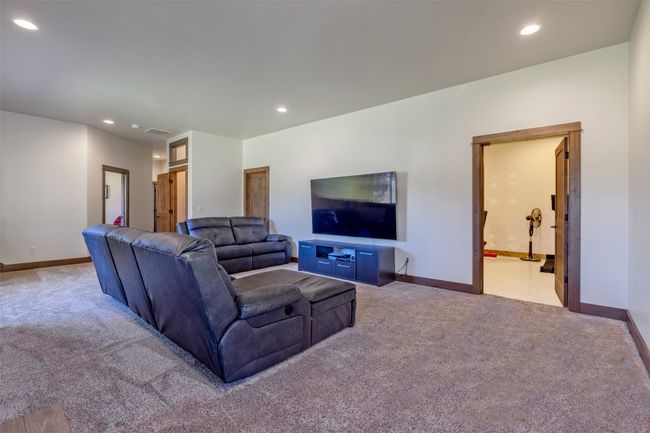 Living room featuring carpet flooring, recessed lighting, and baseboards | Image 33