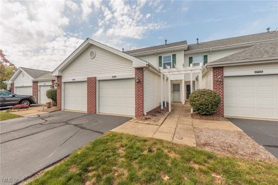 View of front facade with a garage | Image 1