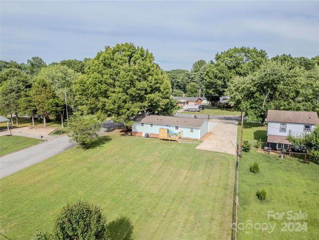 Lot is huge with an area for growing vegetables or space for pool, a second driveway or build on an addition or ADU! | Image 5