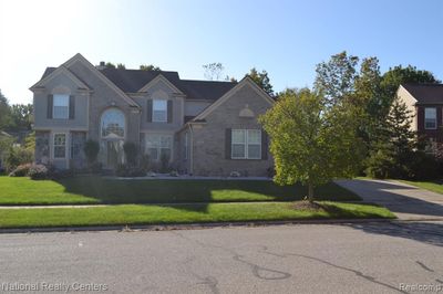 8290 Hummingbird Drive, Home with 4 bedrooms, 2 bathrooms and null parking in Ypsilanti Twp MI | Image 3