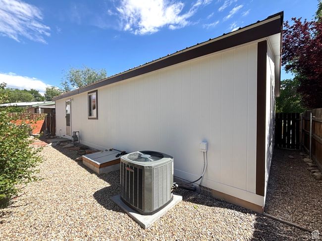 View of home's exterior featuring central AC unit | Image 56