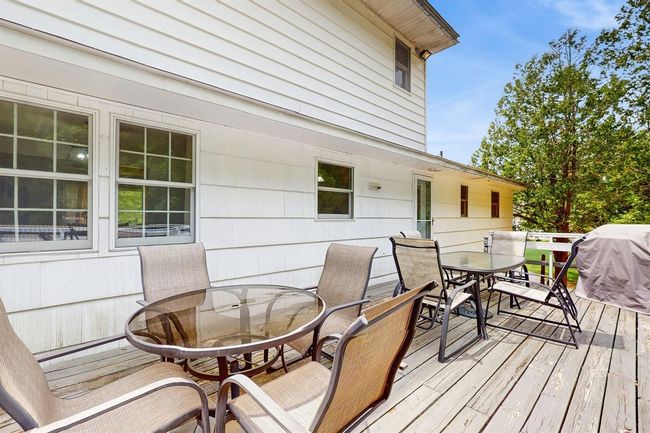 Deck with outdoor dining space | Image 43