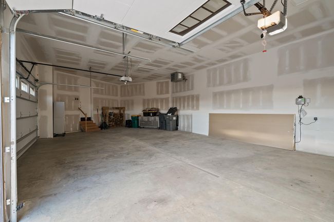 View of the attached 3-car heated garage. | Image 26